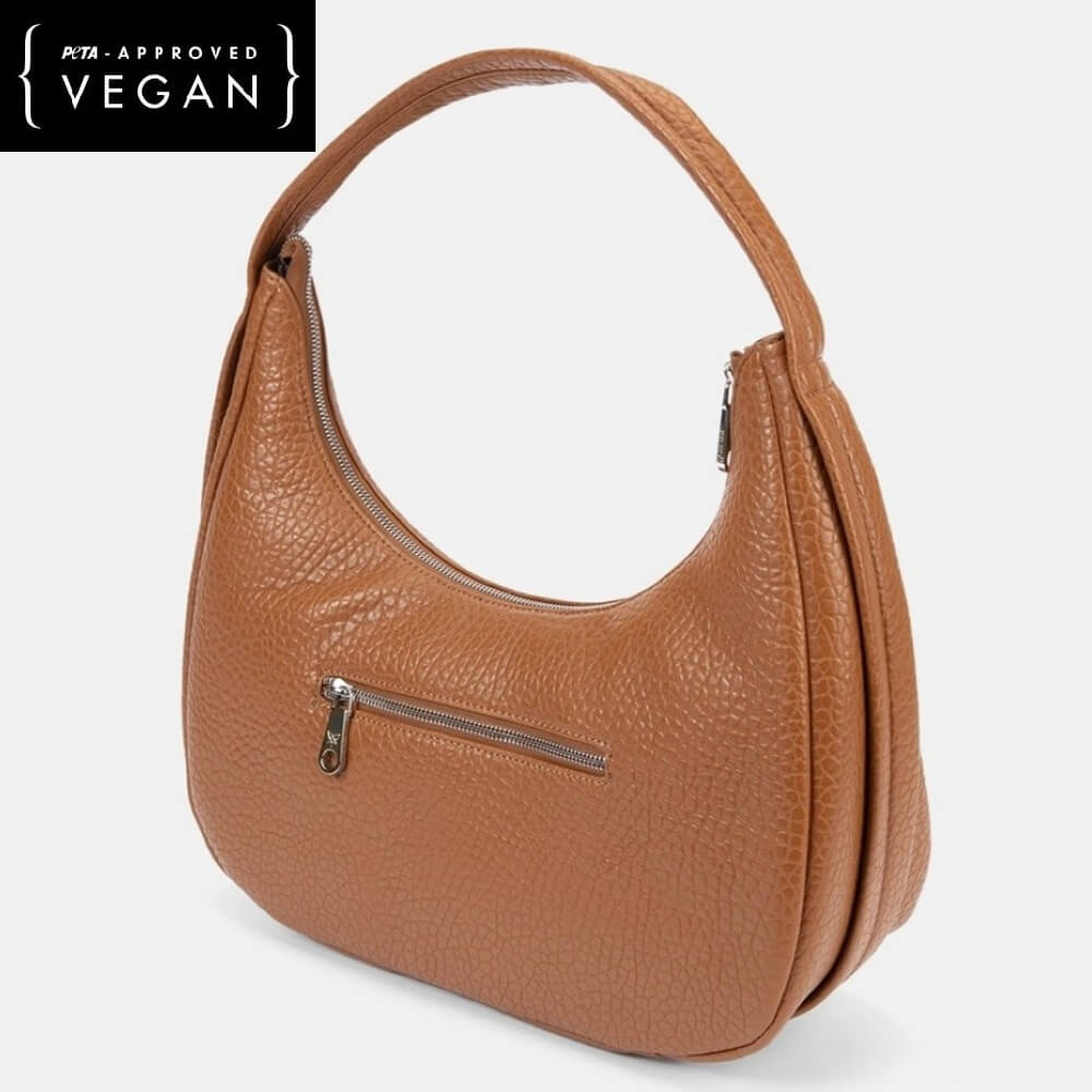 Brown vegan handbag with a visible zipper on a white background, featuring PETA-approved Vegan label.