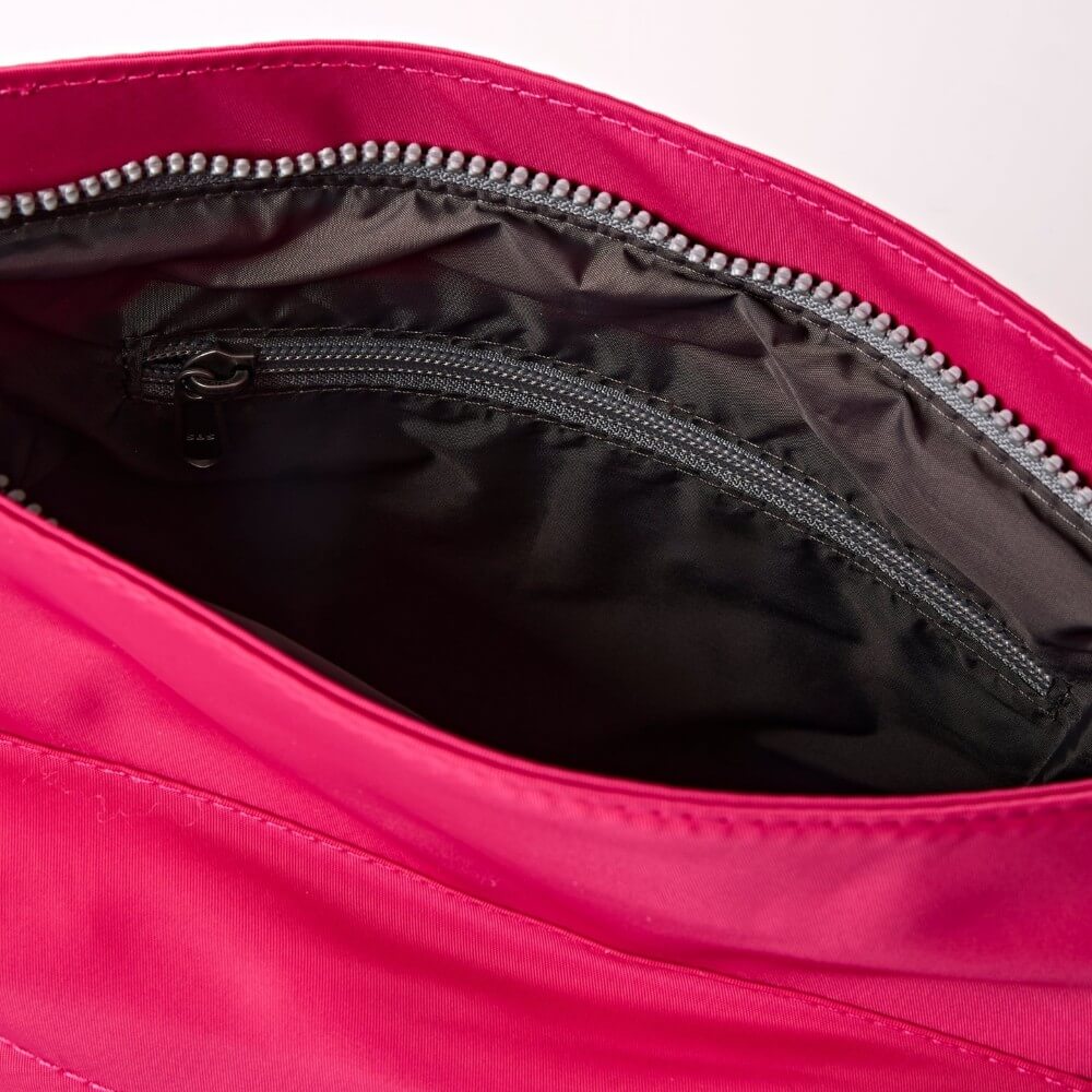 Roka Pink shoulder bag with a strap on a white background