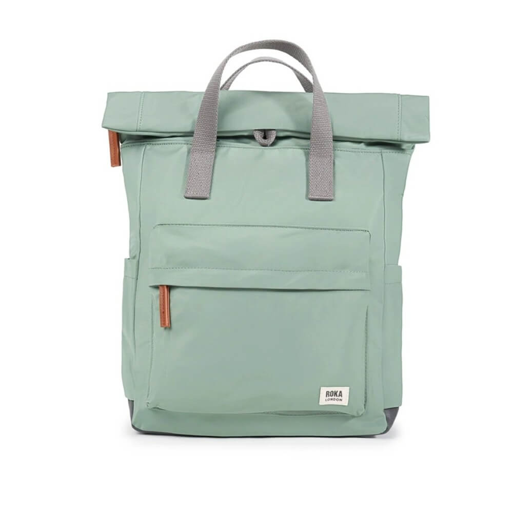 Green backpack with gray straps on a white background