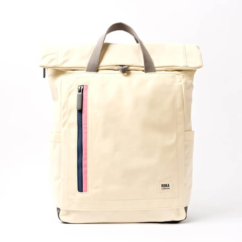 Roka Beige backpack with a pink zipper on a white background