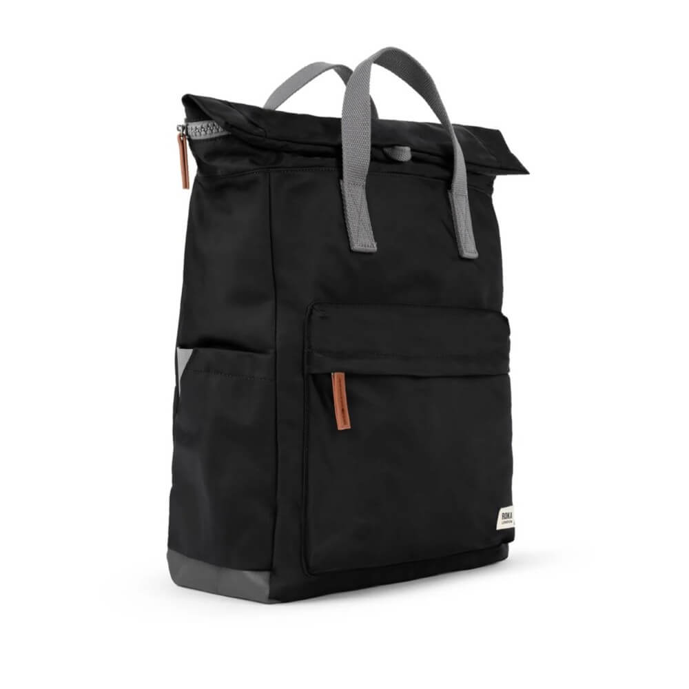 Black backpack with gray handles on a white background