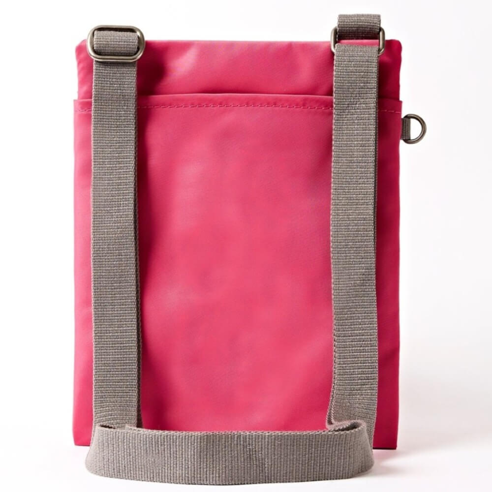 Pink Roka crossbody bag on a white background