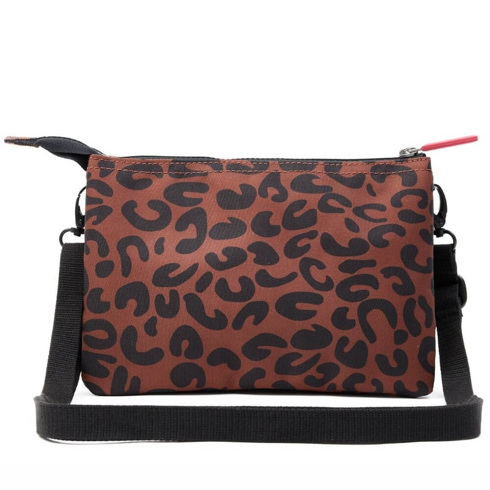 Leopard print bag with a black strap on a white background