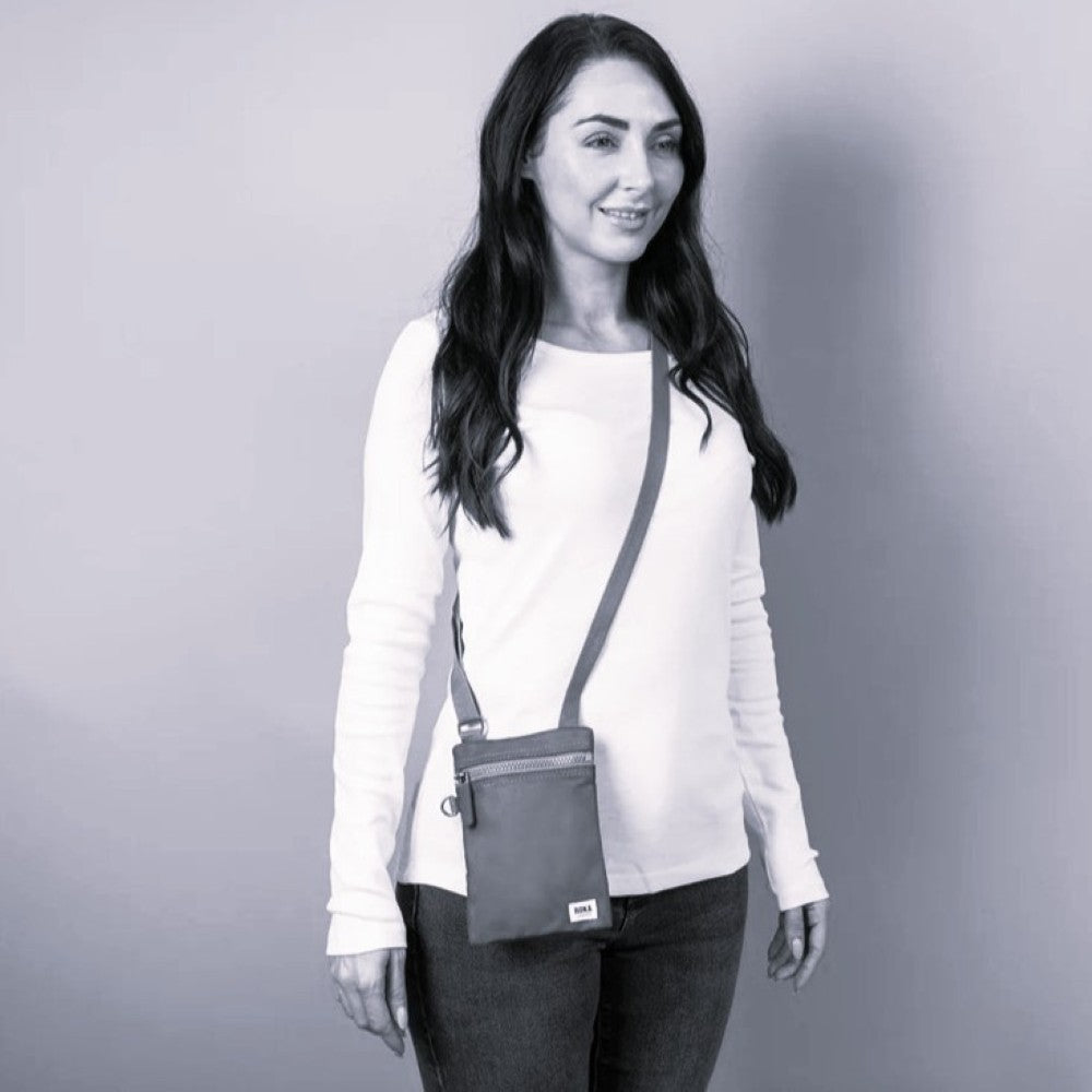 Person wearing a Roka Chelsea Pocket Crossbody 