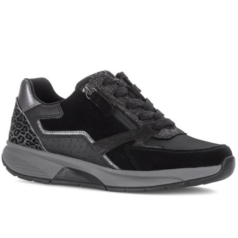 A Rollingsoft black low-top sneaker with mixed materials including suede, Leather, and leopard-print panels, featuring a side zipper and thick grey sole, shown against a plain white background.