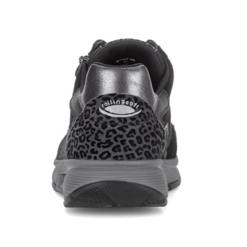 A Rollingsoft black low-top sneaker with mixed materials including suede, Leather, and leopard-print panels, featuring a side zipper and thick grey sole, shown against a plain white background.