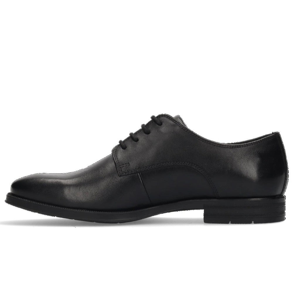 Pair of Salamander Black leather dress shoes on a white background
