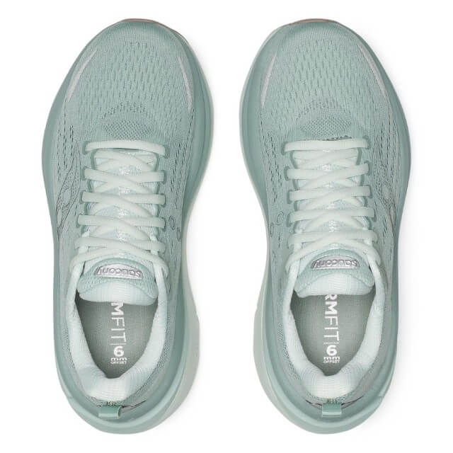 Pair of Saucony light grey running shoes with white laces on a white background