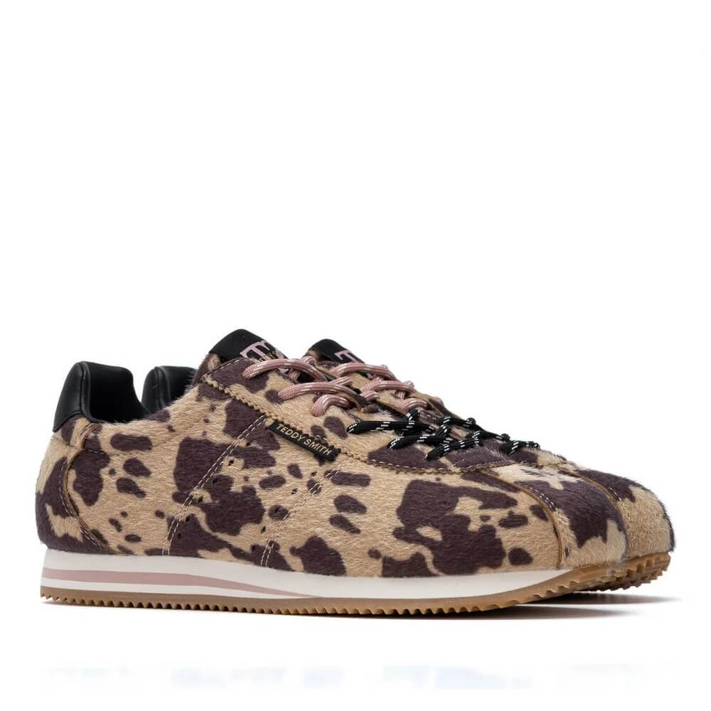 A pair of Teddy Smith low-top sneakers featuring a beige and dark brown animal print pattern, with black laces, a black heel tab, and a white midsole with a light pink stripe.