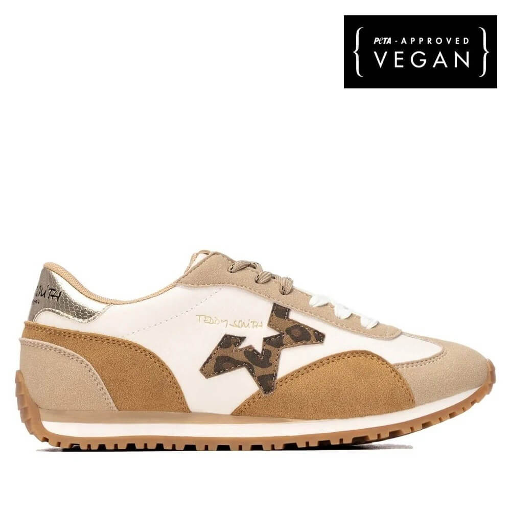 A Teddy Smith low-top sneaker shown in profile against a white background, featuring cream and tan panels with a brown camouflage star logo on the side. A black square badge in the top right corner reads 'PETA-APPROVED VEGAN'.