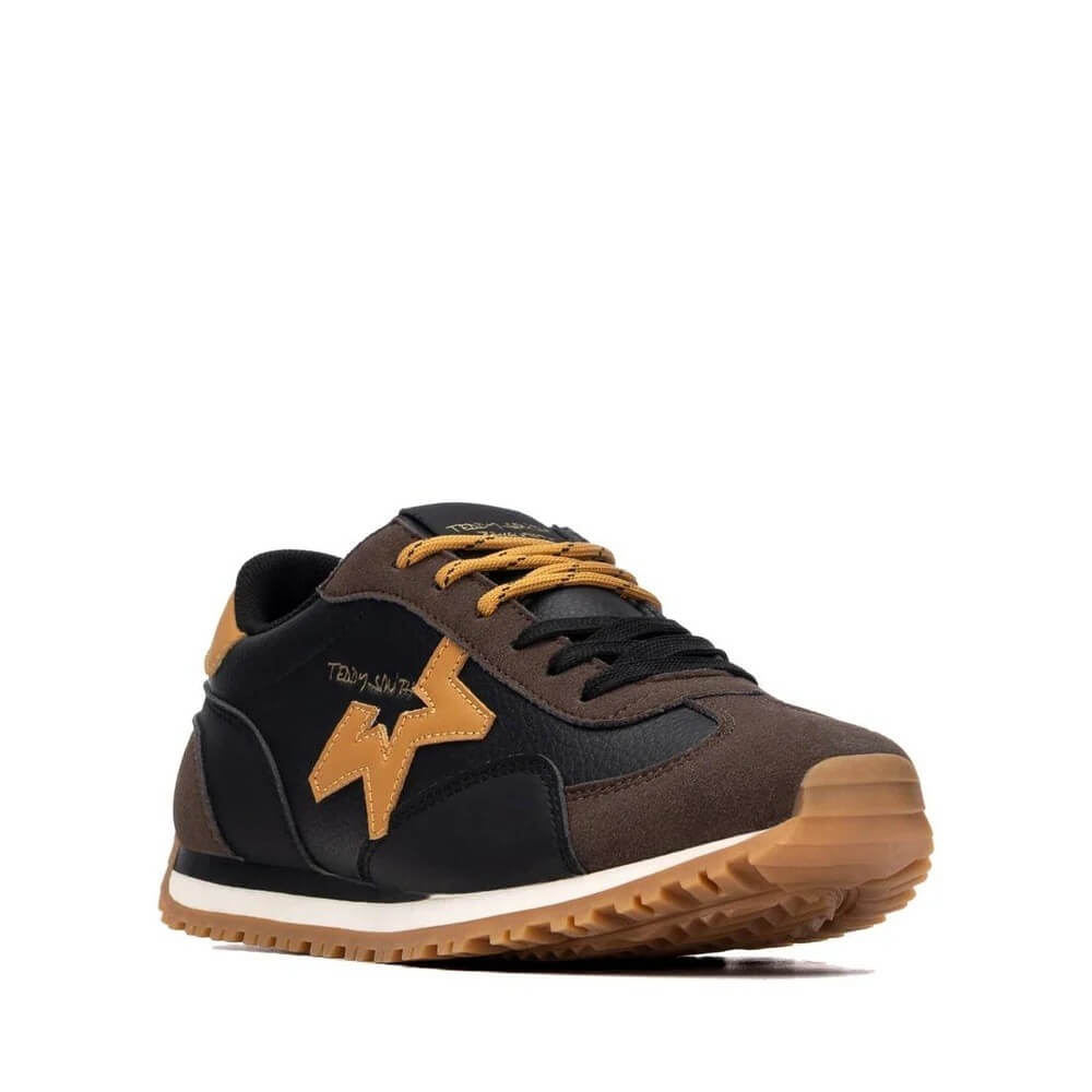 A Teddy Smith low-top sneaker in dark brown and black with mustard yellow laces, a yellow logo, and a gum sole, shown on a plain white background.