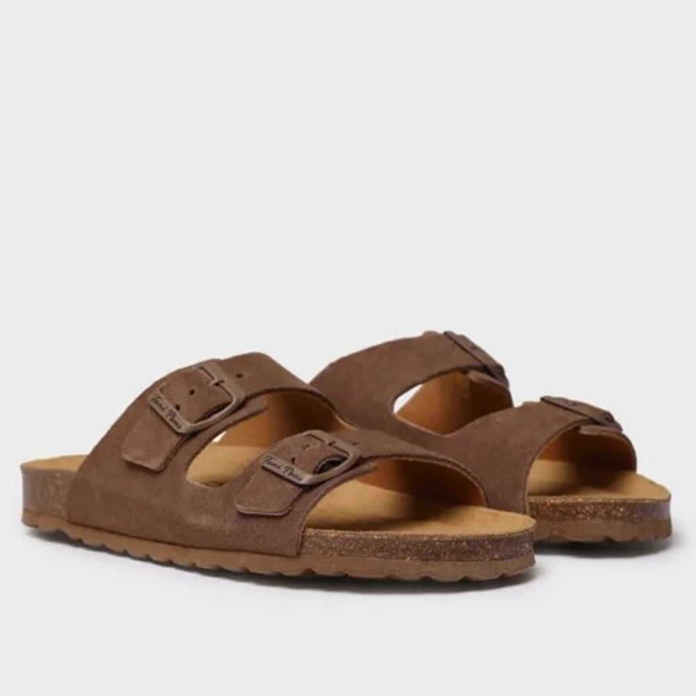 Pair of brown sandals with 'Toni Pons' branding on a light grey background