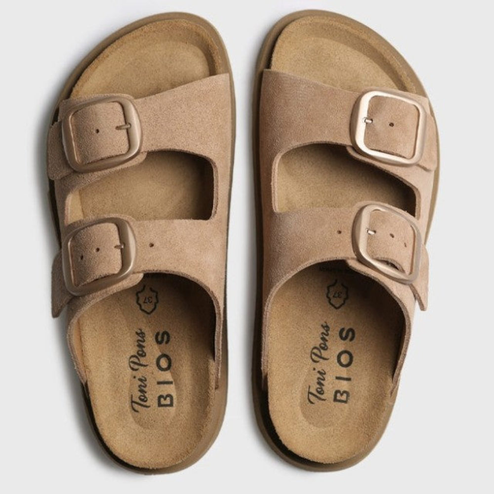 Pair of Toni Pons tan sandals with buckles on a white background