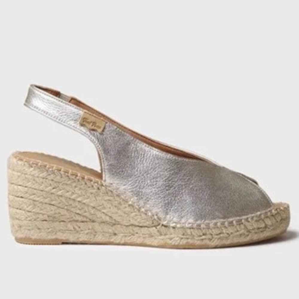 Toni Pons Gold open-toe shoes on a light grey background