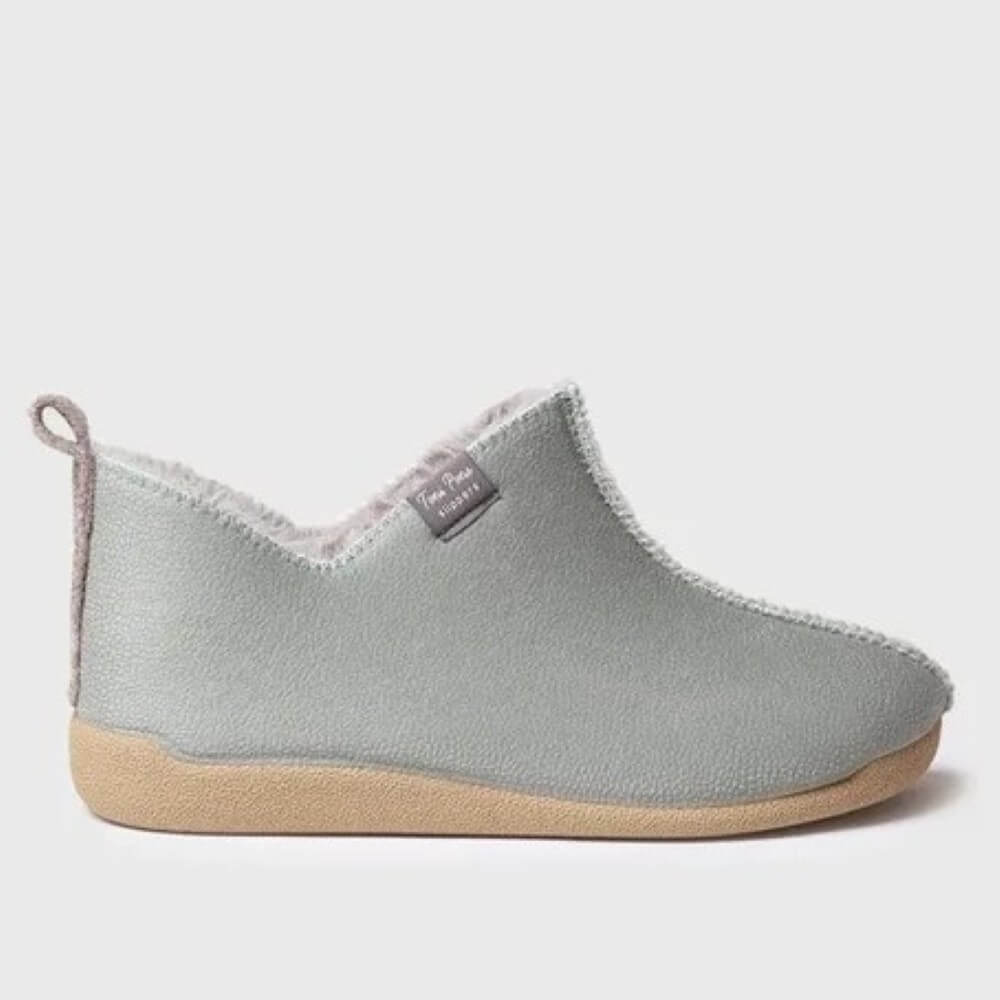 A Toni Pons mint green slip-on slipper with a soft fuzzy lining and a tan rubber sole, shown in a side profile on a light gray background.