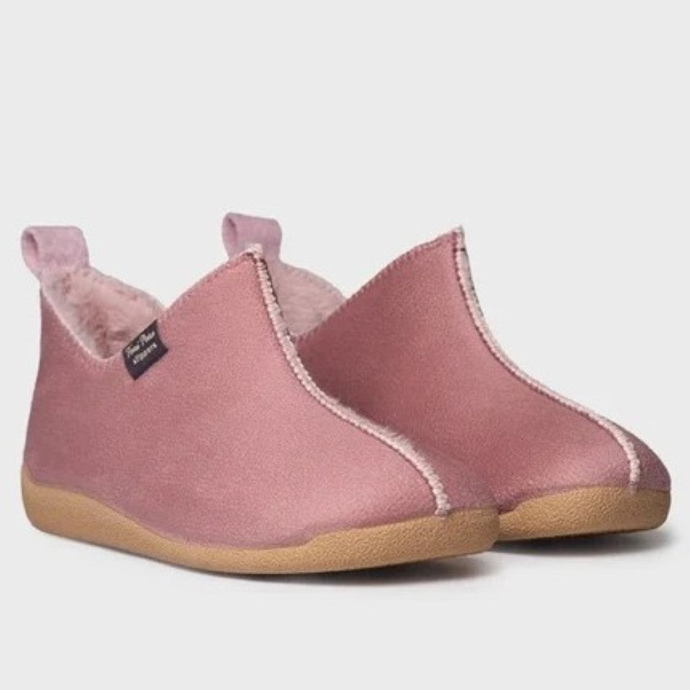 A pair of Toni Pons slip-on slipper shoes in dusty pink suede with a soft pink fleece lining and tan rubber soles, shown against a light grey background.