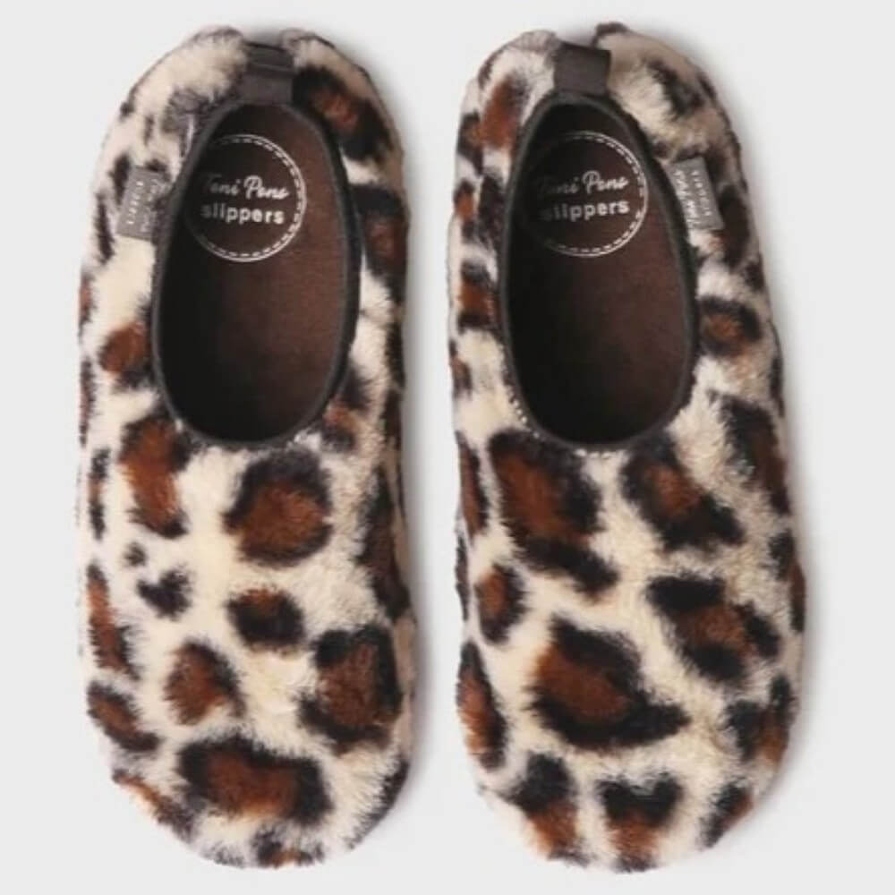 A pair of Toni Pons fuzzy slip-on slippers with a brown, black, and beige leopard print pattern, shown from a top-down view on a light grey background.
