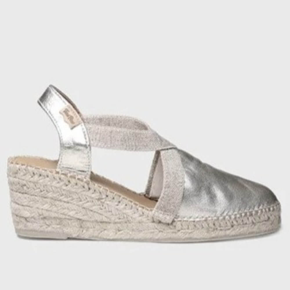 Toni Pons Silver wedge sandal with espadrille sole on a light grey background