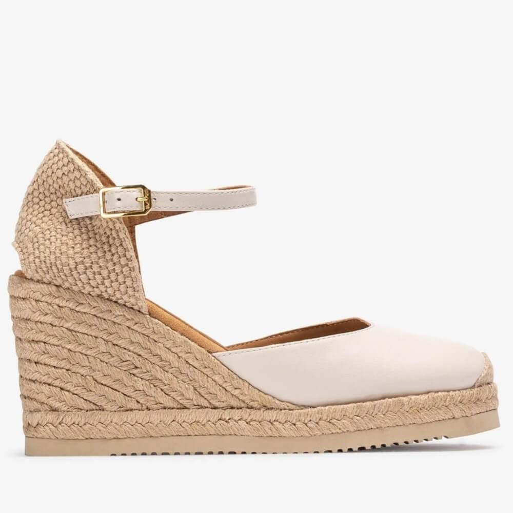 ivory wedge sandals with jute sole on a white background