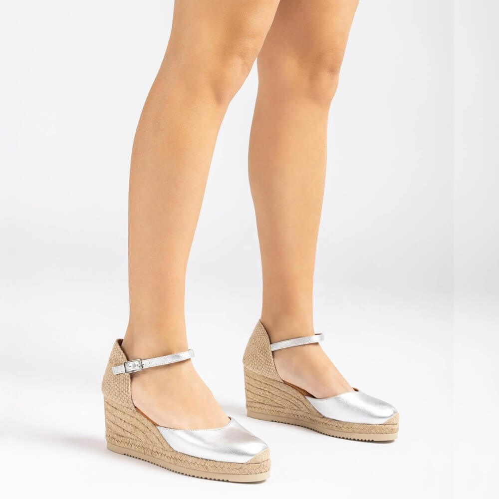 Person wearing Unisa Caceres Silver Espadrilles 