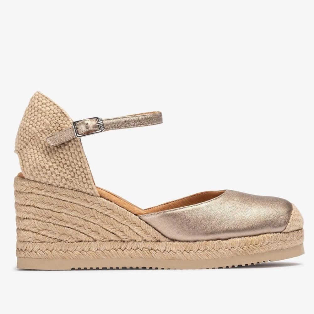 Unisa Caceres Gold wedge sandals with woven details  