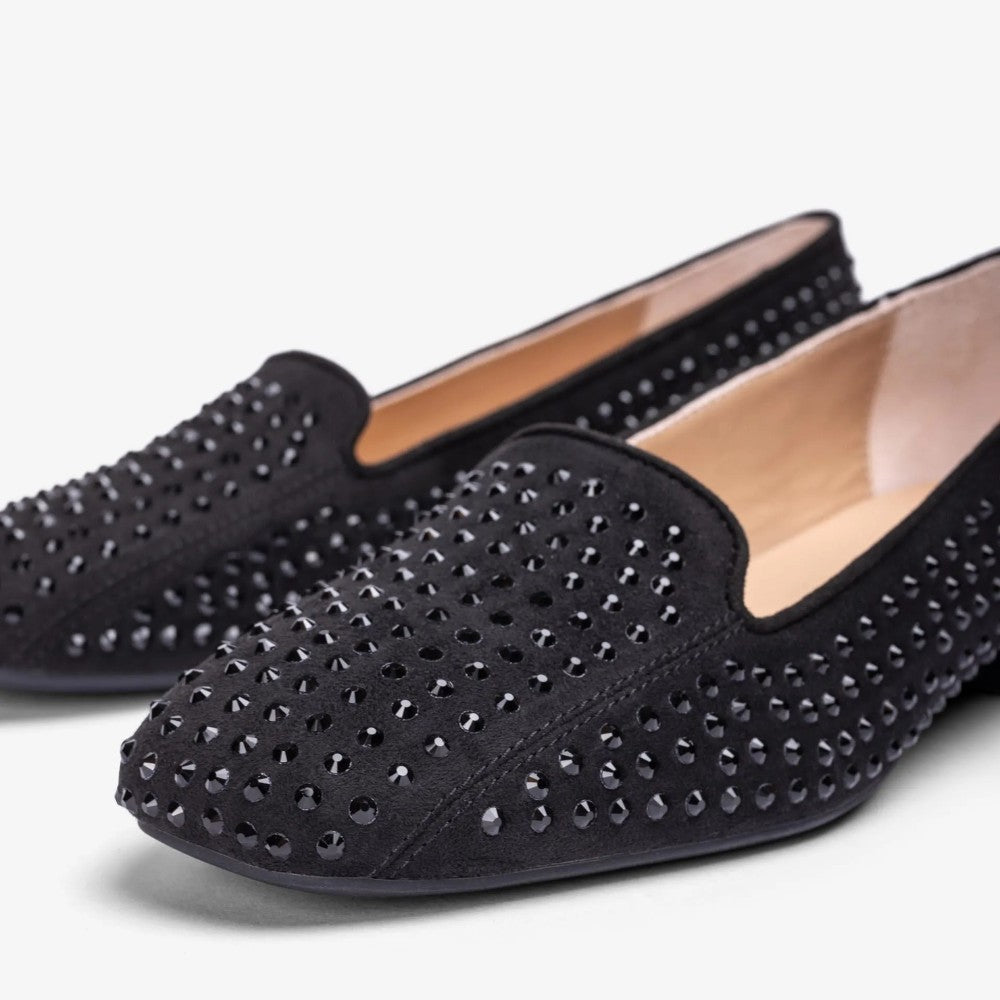 Pair of Unisa Capito Black Suede Loafers with studs on a white background