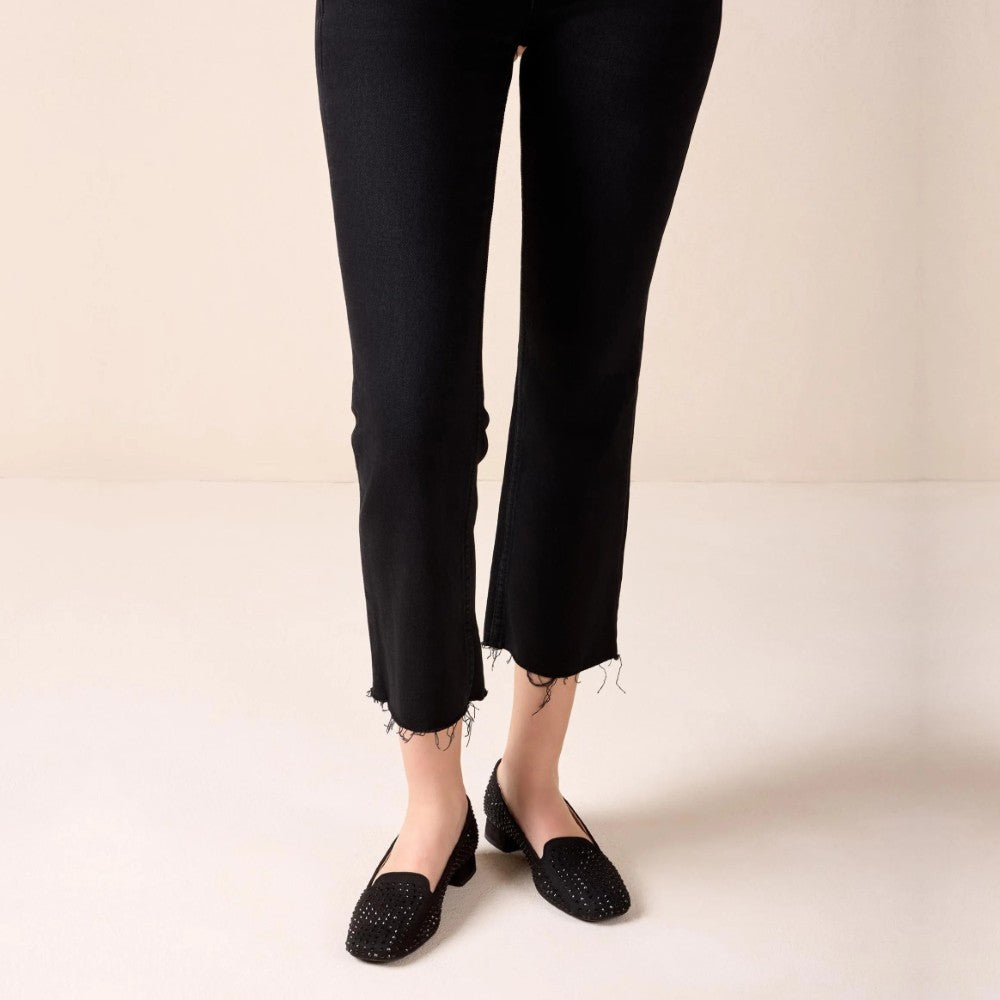 Person wearing Unisa Capito Black Suede Loafers with studs  with lack jeans