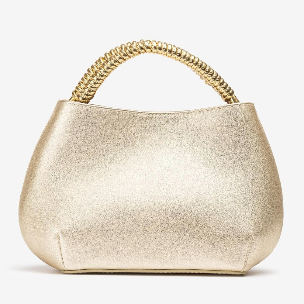 Unisa Gold handbag with braided handle on a white background
