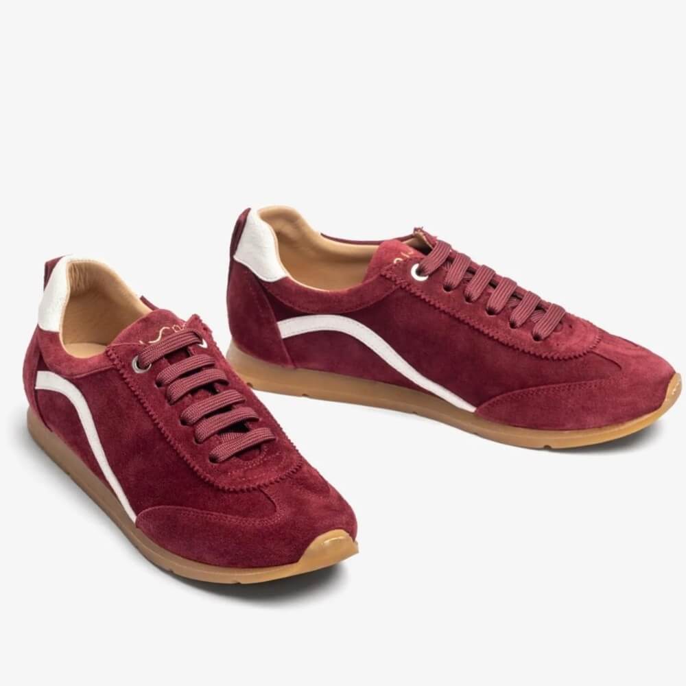 Red sneakers with white accents on a white background Unisa Dalai Suede Trainer Wine