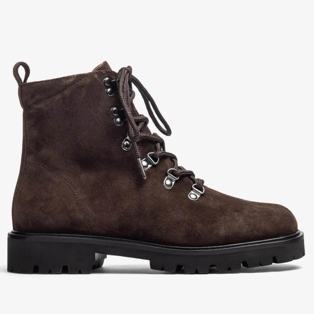 Brown suede boot with black sole on a light gray background Unisa Fiela Suede Leather Ankle Boot Brown