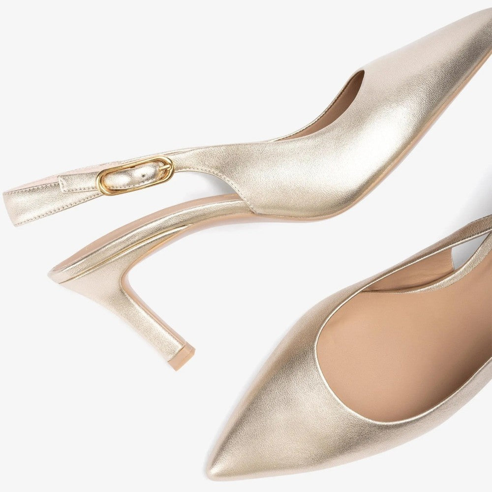 Gold high-heeled shoe on a white background unisa lanz