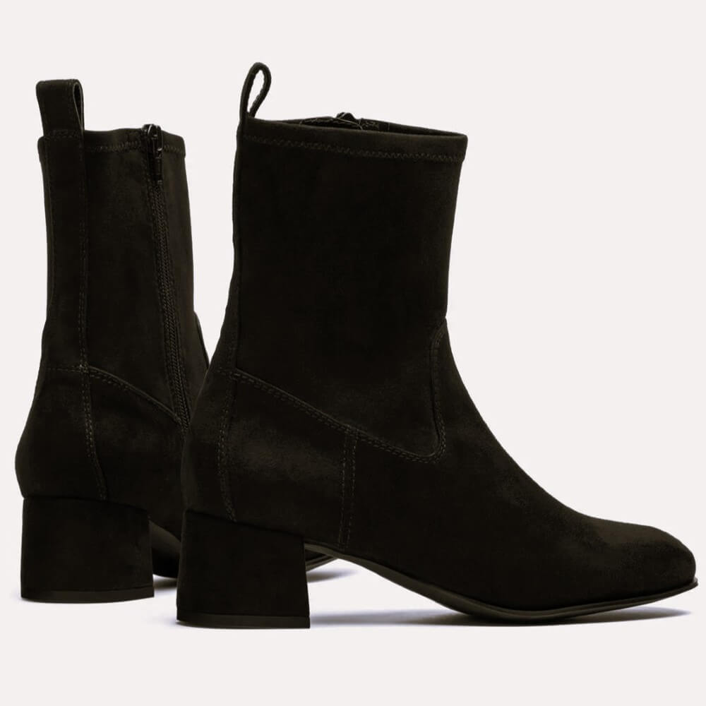 Black ankle boot on a light gray background Unisa Lemico Square toe ankle boot made in faux suede