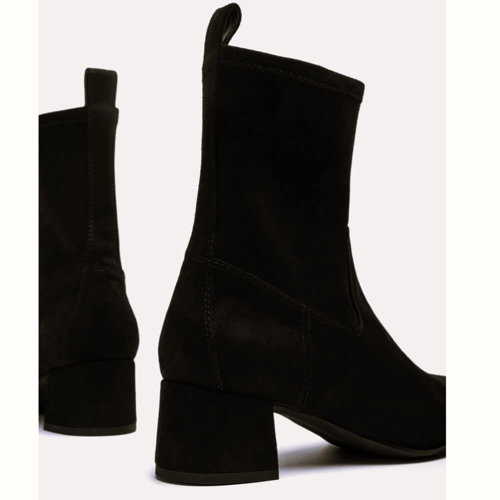 Black ankle boot on a light gray background Unisa Lemico Square toe ankle boot made in faux suede