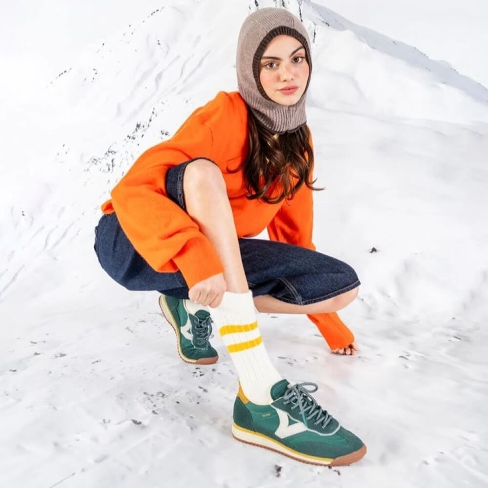 Green, white and yellow sneaker with a white logo on a white background Victoria Saturino Sneakers 1158101