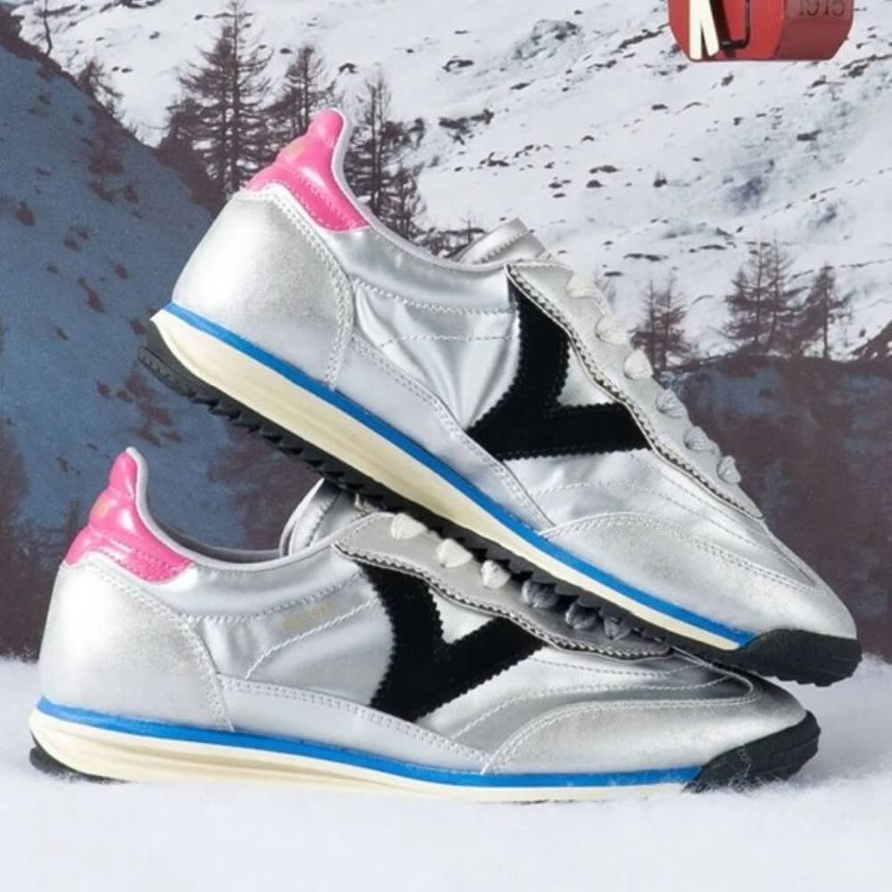 Silver sneakers with pink and black accents on a snowy mountain background VICTORIA SATURNO Sneakers 1158102 SILVER