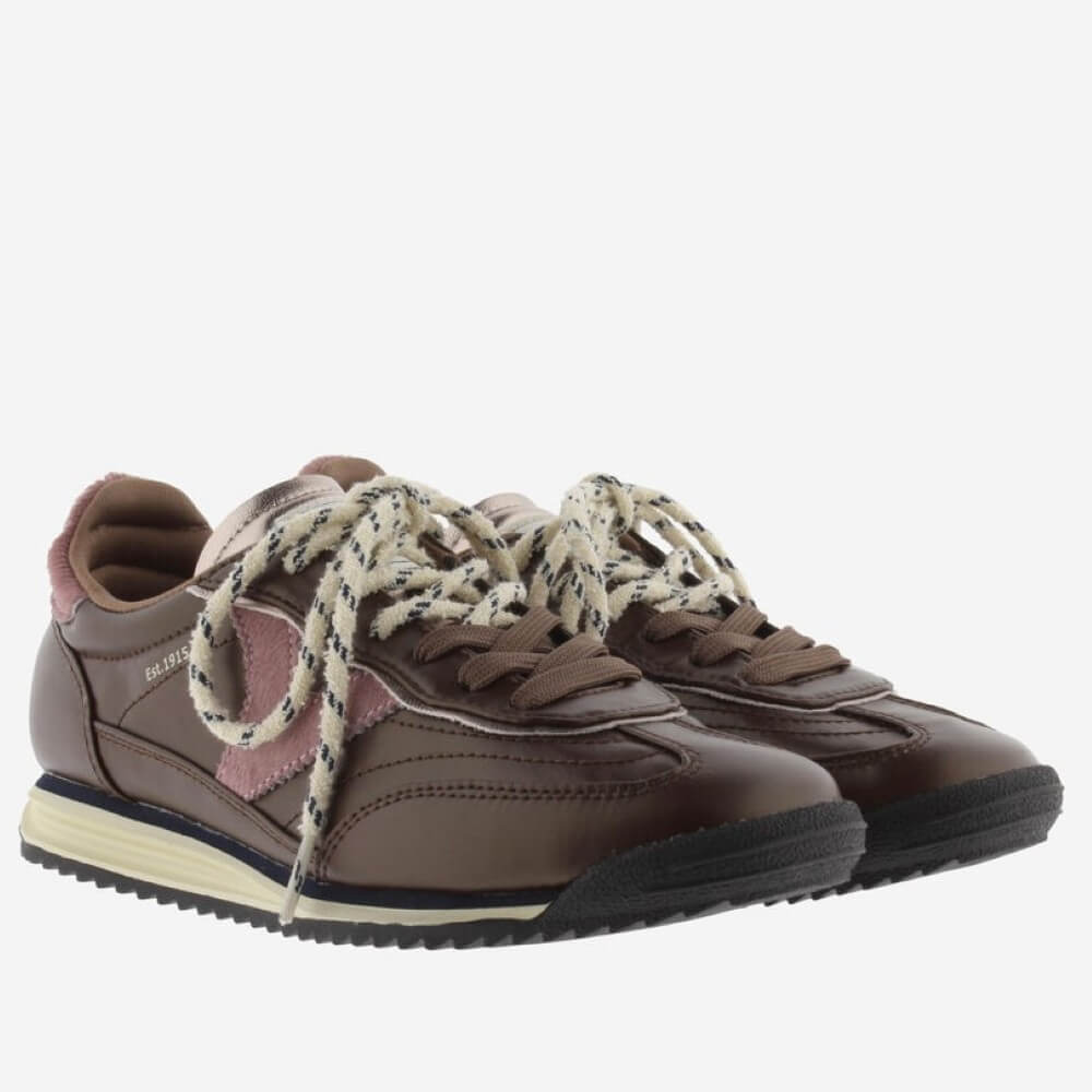 A pair of Victoria brown sneakers with dusty pink accents, cream rope laces, and a black and cream sole, shown from a side profile on a light grey background.