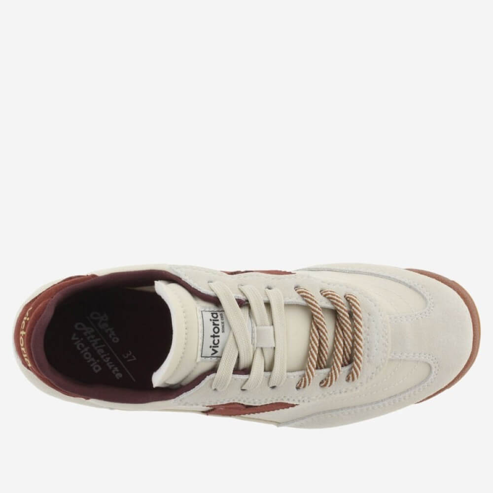 A top-down view of a Victoria Off-White low-top sneaker in off-white suede and canvas with brown rope laces and a dark brown interior.