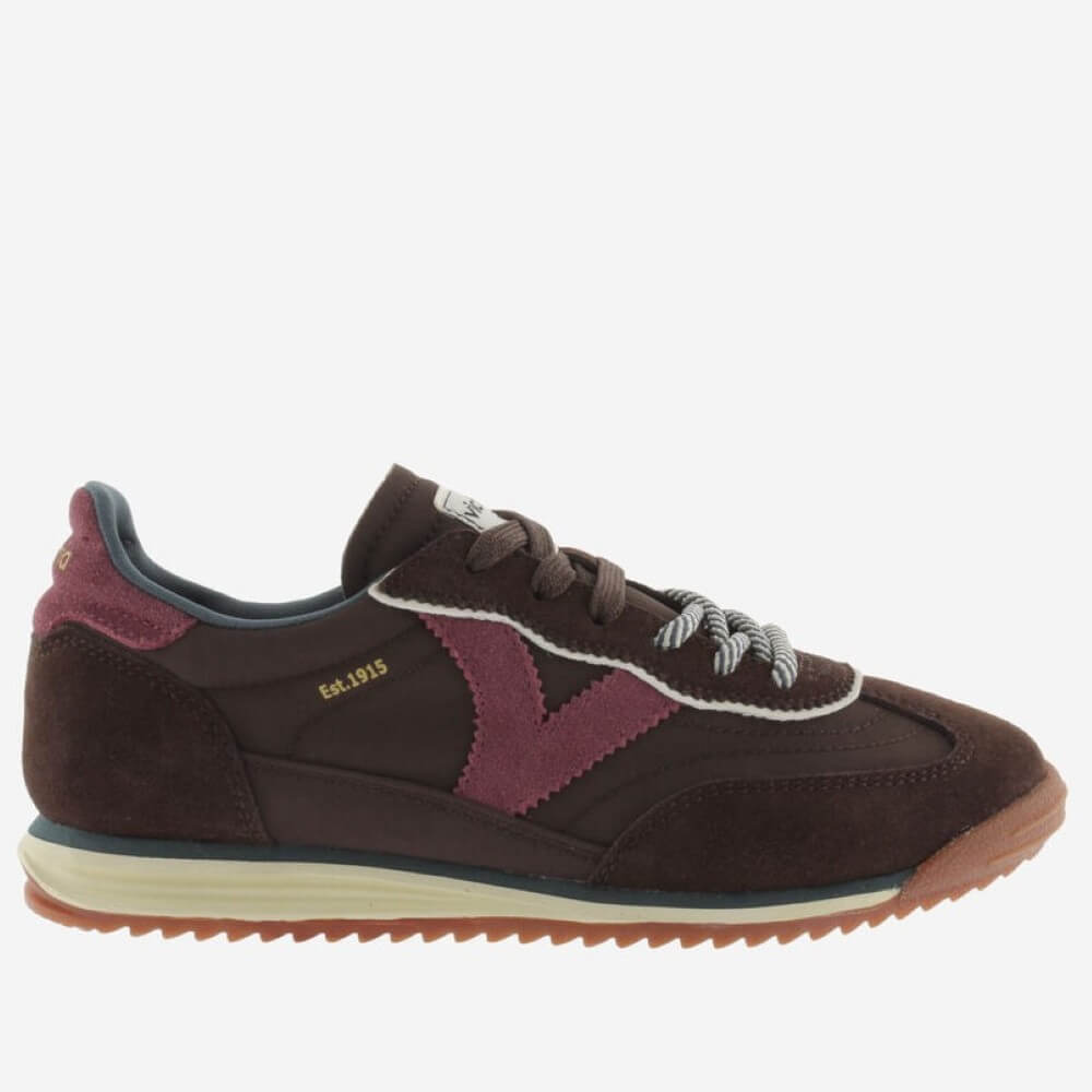 A dark brown suede Victoria sneaker with burgundy overlays, white laces, and a cream midsole on a light grey background.