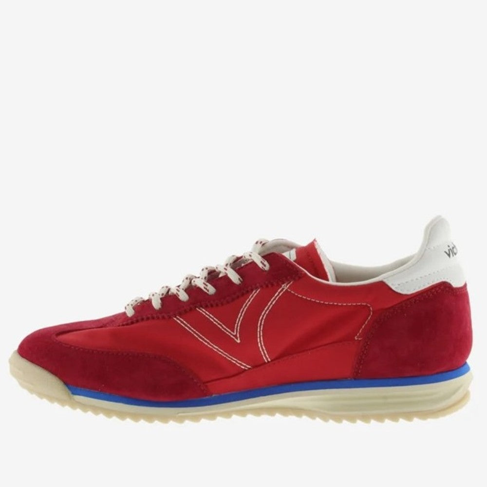 Victoria red trainers on a white background