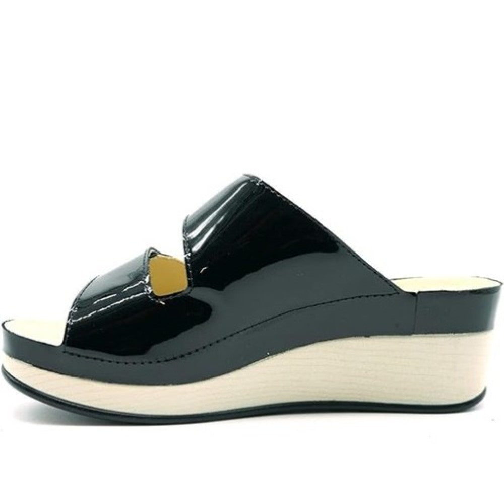 Vital Black patent leather sandal with a white sole on a white background