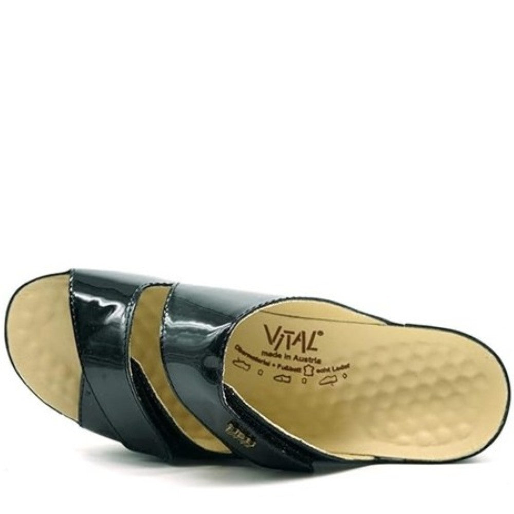 Vital Black patent leather sandal with a white sole on a white background
