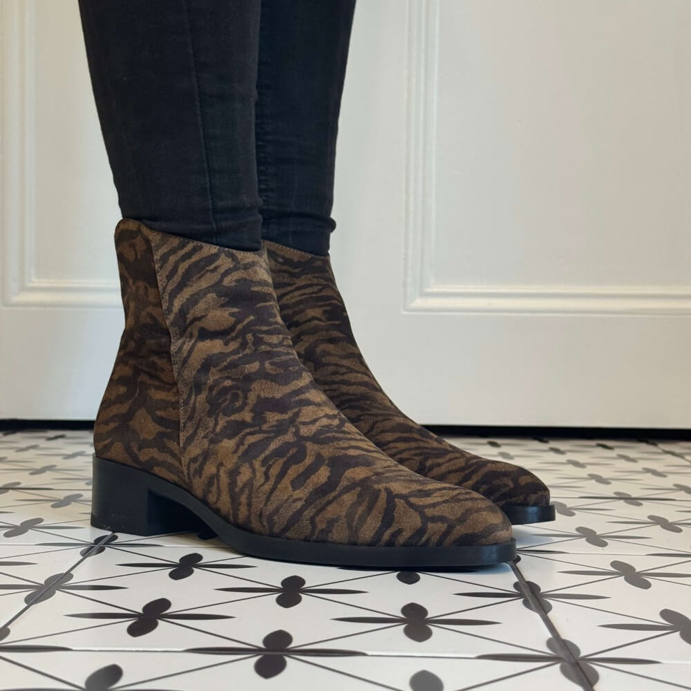 Brown zebra patterned ankle boot worn with black pants Wonders Bonjour 01 Leather Ankle Boot  D-1801 WONDERS-ZEBRA