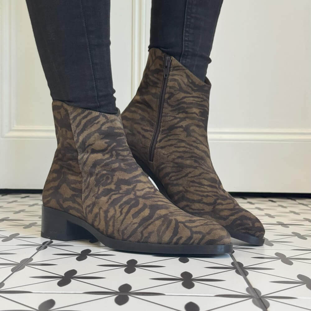 Brown tiger-patterned ankle boot worn with black pants Wonders Bonjour 01 Leather Ankle Boot  D-1801 WONDERS-ZEBRA
