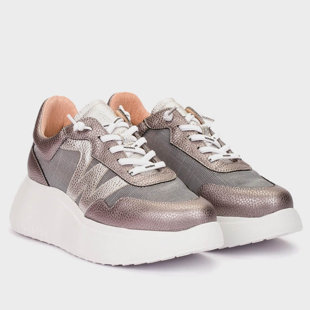 Grey metallic sneaker with white sole on a light grey background