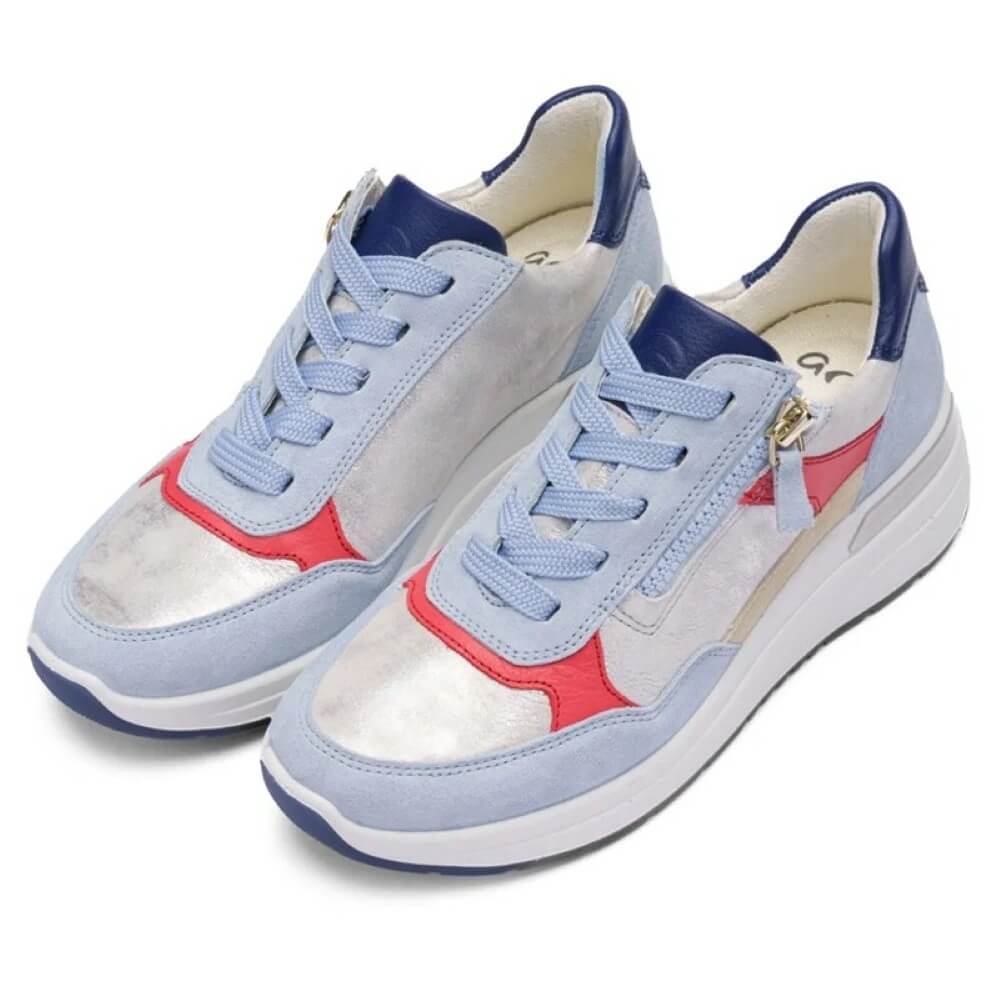 Pair of sneakers with blue, red, and white color scheme on a white background