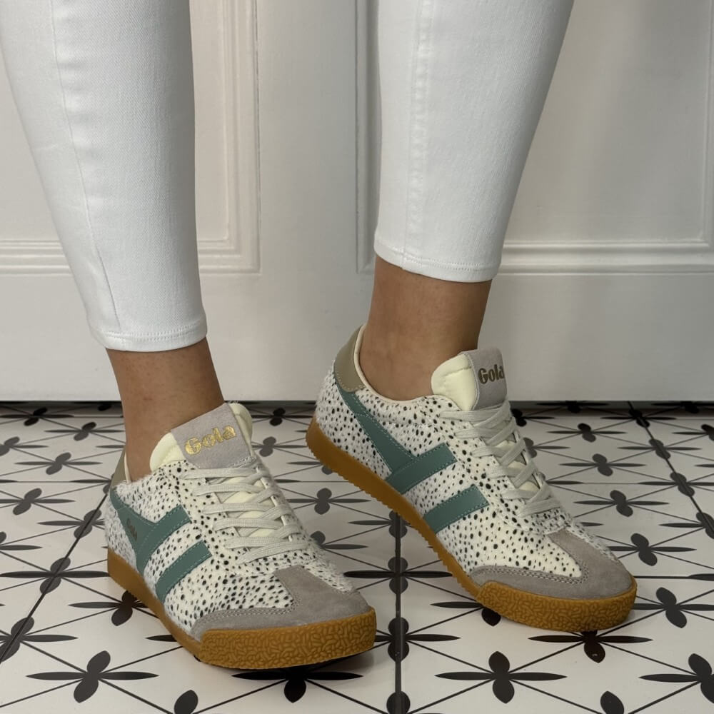 Gola Elan Cheetah gum sole sneakers worn with white jeans