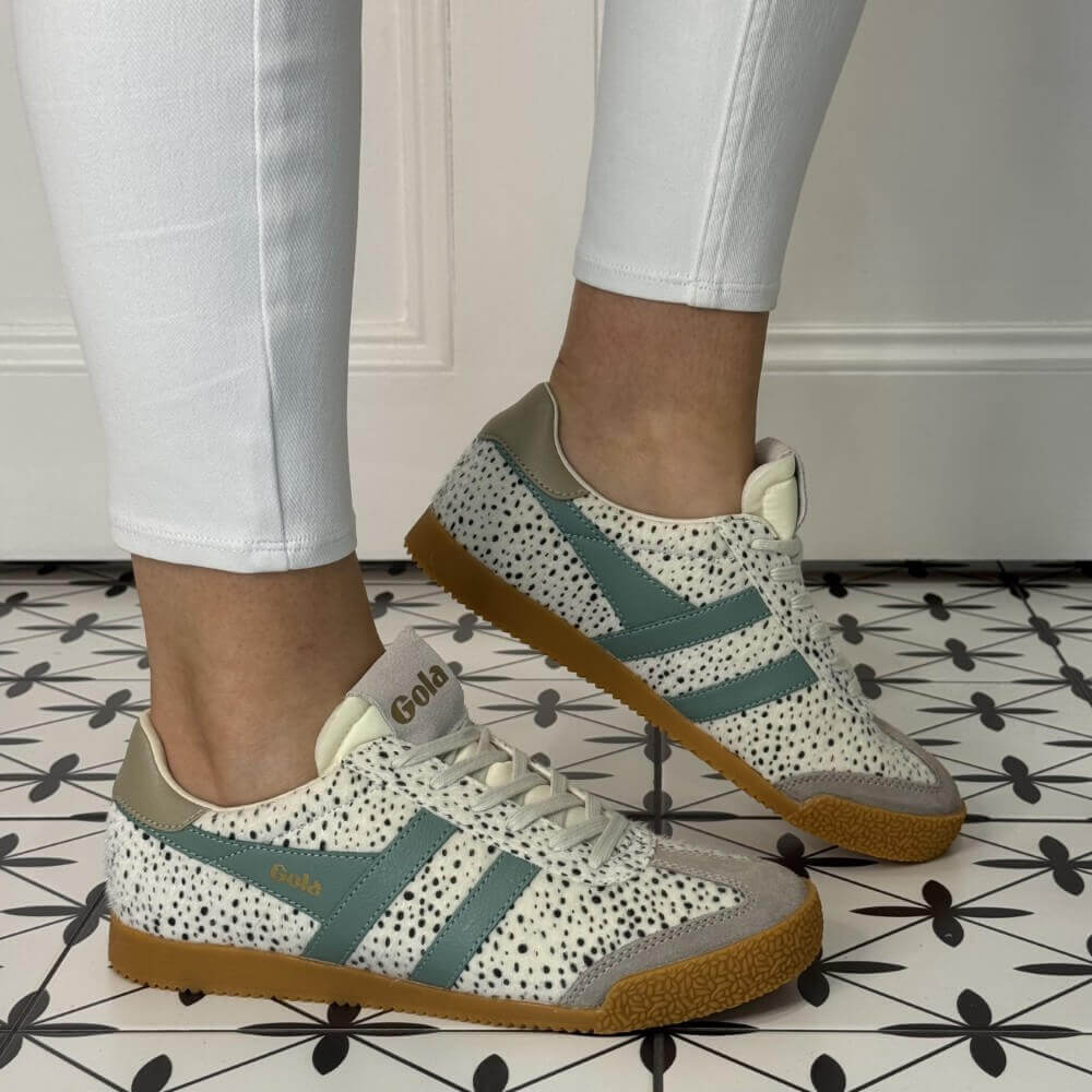 Gola Elan Cheetah gum sole sneakers worn with white jeans