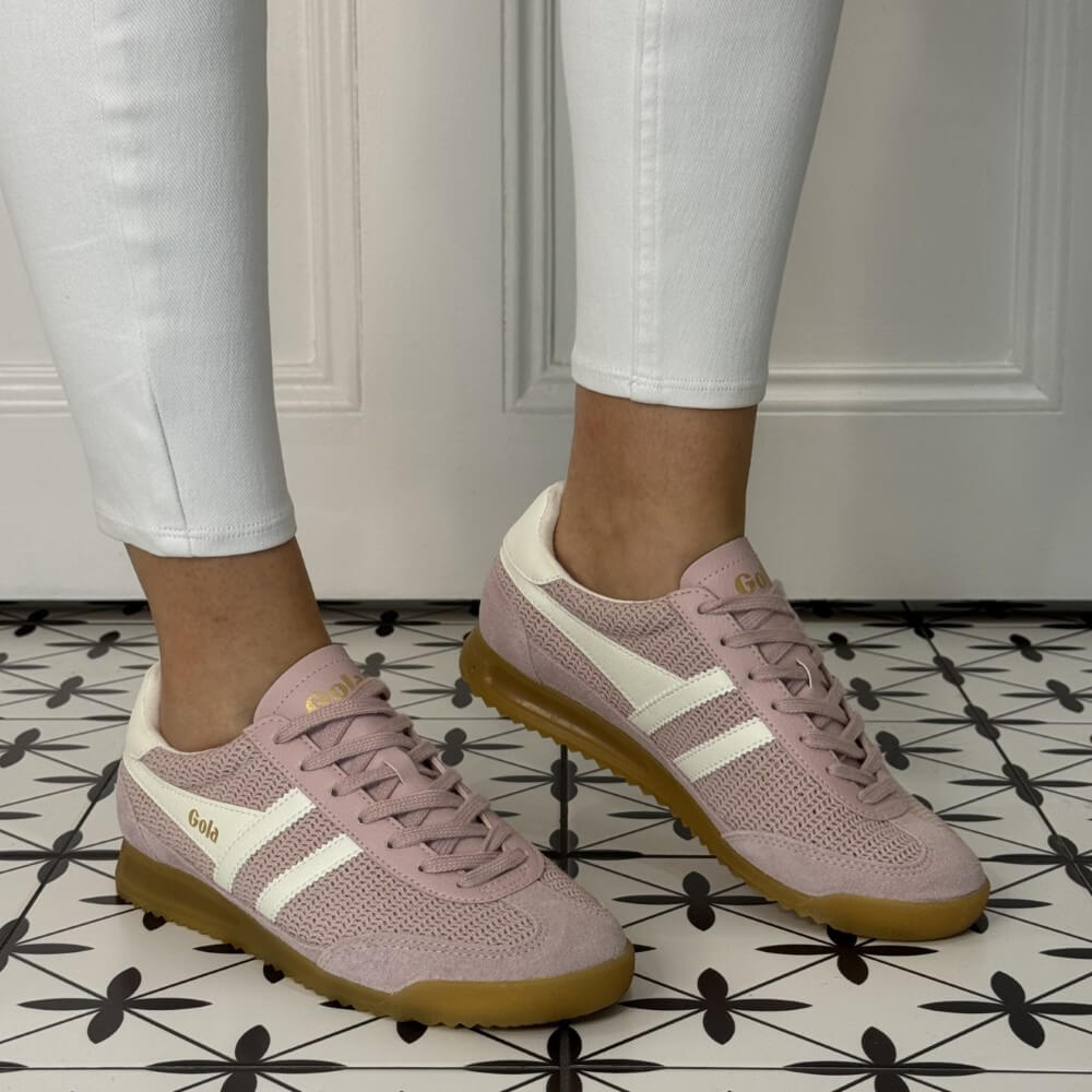 Gola Pink sneakers with white accents worn indoors on a patterned floor. Tornado Zephyr