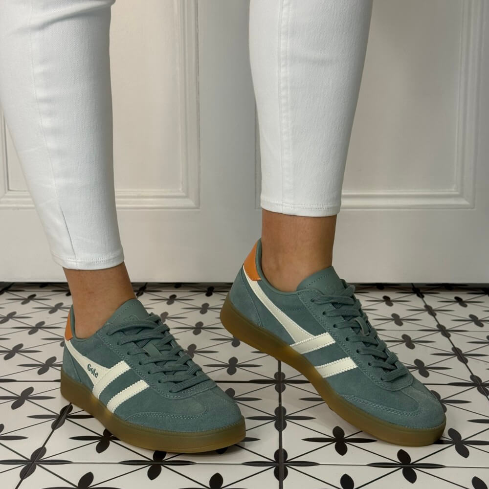 Gola viper Green and white gum sole sneakers worn with white jeans 