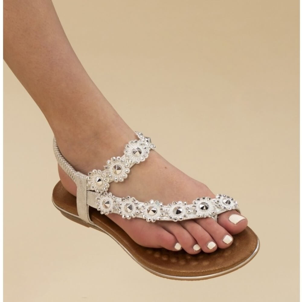 Person Wearing Lunar Charlotte Silver sandal with gemstone embellishments 
